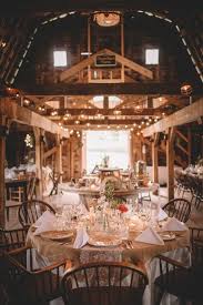 cozy barn reception with white table