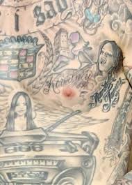 Flower sleeve #tattoo #tattoos · smile tattoo #tattoo travis barker is one of the men who are in love with the tattoos. Travis Barker Gets Kourtney Kardashian Tattoo On His Chest Entertainment Tonight