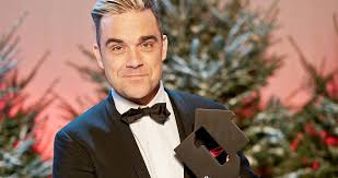 robbie williams unveils the video for his new christmas single