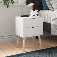 Crafted of solid and manufactured wood with veneers, and available in a curated selection of fashionable finishes, this dapper design strikes a narrow, rectangular silhouette with tasteful. Zipcode Design Lalani 2 Drawer Bedside Table Reviews Wayfair Co Uk