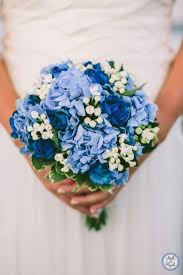 Wedding Bouquet With Blue Flowers Santorini Wedding Destination Wedding By Stella And Moscha E Santorini Wedding Blue Wedding Flowers Blue Themed Wedding
