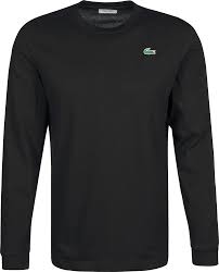 An elegant tennis player who believed in fair play, and a passionate inventor behind a clothing revolution. Lacoste Classic Longsleeve Schwarz