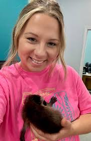 Customer brings baby raccoon to pet friendly store