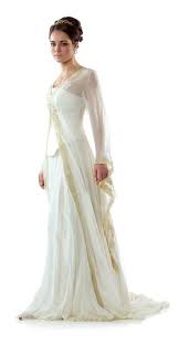 Our creations are often designed around our bride's wishes and are based on fantasies suggested by fairytales. Celtic Wedding Dress From Lindsay Fleming Tyra With Kilda Coat Irish Wedding Dresses Celtic Wedding Dress Traditional Irish Wedding Dress