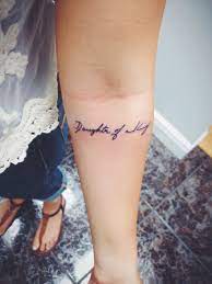 Tattoo Daughter Of A King In My Mothers Hand Writing For I Am A Child Of God And He Is King Of Kings Check Out Tattoos For Daughters Tattoos Writing Tattoos