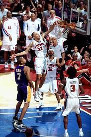 Tayshaun Prince Of The Detroit Pistons Dunks Over Brian Cook Of The Detroit Pistons Kobe Bryant Pictures 2004 Nba Finals