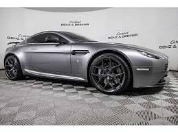 Image result for Titanium Silver 2011 Aston Martin
