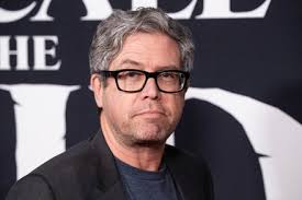 John Powell Poses On Red Carpet Editorial Stock Photo