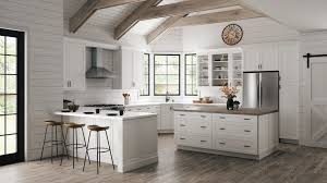 Homeowners often use home centers like lowes and the home depot to design their kitchens and to buy cabinetry. Melvern Wall Cabinets In White Kitchen The Home Depot