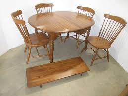 Remove the current seat pad from the chair by unscrewing the pad from the based in pennsylvania, emily weller has been writing professionally since 2007. Albrecht Auctions Pennsylvania House Dining Room Table With 4 Chairs And A Leaf