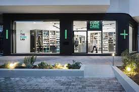 Cure Care Pharmacy On Behance Pharmacy Design Shop Front Design Shop Window Design