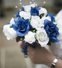 Whether you are looking for artificial bridal bouquets or chair backs, a bridesmaid posy or a wedding cake topper, we have it all covered. Close Up Of A Blue And White Wedding Bouquet Held By Bride Stock Image Image Of Bunch Elegance 101963565