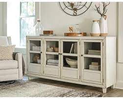 This cabinet has lots of potential with four wide and roomy shelves to. Signature Design By Ashley A4000269 772 55 Accent Cabinet Glass Cabinet Doors White Storage Cabinets
