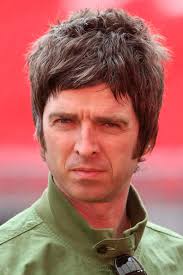 By lengthening the hair on the sides of the head and using a spiked look, gallagher is able to carry off what would otherwise be only his dark beard growth and startling blue eyes. Noel Gallagher Quits Oasis Noel Gallagher Zimbio