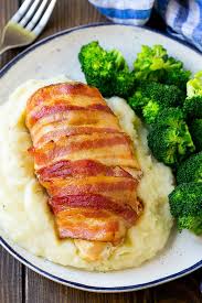 Bacon Wrapped Jalapeno Popper Chicken Served With Mashed Potatoes And Broccoli Jalapeno Popper Chicken Food Granny S Recipe