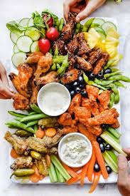 How To Host A Game Day Party Food Platters Party Food Appetizers Party Food Platters