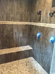 Speaking of wood and modern, you don't have to have a rustic bathroom to have a wood tile shower. Love This Shower With Tile That Looks Like Wood Farmhouse Shower Shower Tile Wood Tile Bathroom