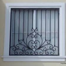 Grades De Protecao Em Ferro Com Desenho E Sem Decoracao De Ferro Decoracao De Ferro Forjado Grades Para Janelas