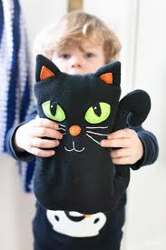Follow the pattern templates to cut out two side pieces, two ears, one bottom piece, and one tail from the felt. Free Cat Plush Sewing Pattern Scratch And Stitch