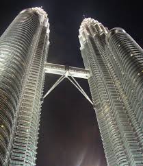 The 'petronas towers' are also called 'petronas twin towers', and 'menara berkembar petronas' and 'menara patronas' in malay; Petronas Towers Discover The Tallest Twin Towers In The World
