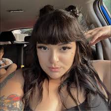 What is the best tattoo shop in Lorain, Amherst, Vermillion area for fine  line tattoos with flowers?