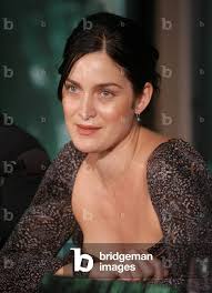 Image of CAST MEMBER CARRIE-ANN MOSS SPEAK WITH REPORTERS TO PROMOTE "THE