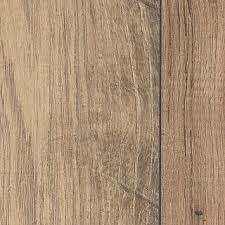 Get the traditional wood flooring look without the hassle of a real wood floor with rustic wood flooring. Rustic Legacy Knotted Chestnut Laminate Wood Flooring Mohawk Flooring