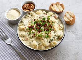 Tuscan Gnocchi Is A Hearty Creamy Vegetarian Dish Recipe Vegetarian Dishes Gnocchi Gnocchi Spinach