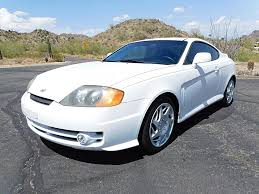 Image result for Sunny Yellow 2004 Tiburon