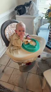 Daddy Trying to Show His Infant Baby How to Dry