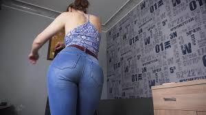 PAWG jeans showcasing big ass in snug jeans