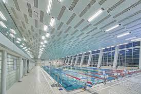 Swimming pool pictures swimming pools paris suburbs architecture cool public architecture storefront signs exterior signage building a pool lap swimming cardio equipment group fitness classes building a pool swim lessons swim team health club sports shops four seasons. Swimming Hall Lighting Freiberger Platz Norka Lighting For Extreme Conditions