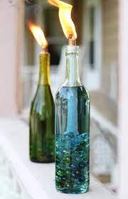 Bottoms Up Turn Your Empty Wine Bottles Into Works Of Art Reuse Wine Bottles Wine Bottle Citronella Candles Wine Bottle Diy
