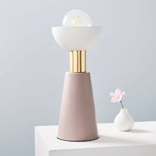 This charming ceramic table lamp is the result of our collaboration. Roar Rabbit Shadeless Accent Table Lamp
