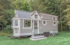But the home's rainbow exterior isn't the only surprising thing about it. The Heritage Tiny House On Wheels Vintage