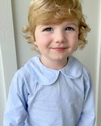 Two-year-old Hampton Hicks… always a scraped knee, a ball, daddy shoes, and  so so sweet🩵