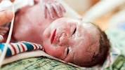 Newborn With Full Head Of Hair
