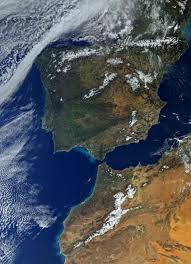 A peninsula is a long narrow piece of land which sticks out from a larger piece of land. Esa Iberian Peninsula
