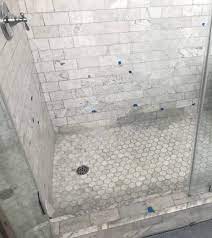Carrera marble bathrooms with grey floors and dark. Carrera Marble Shower Is Turning Grey