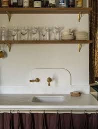 Custom cut marble slab backsplash. Curved Backsplashes In The Kitchen And Bath