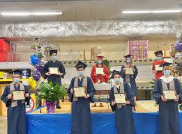 Ellen DeGeneres jumps in to help Winn-Dixie in Slidell celebrate their  employee-graduates