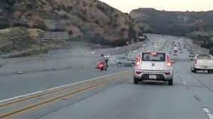Motorcyclist Kicks Car Causes Chain Reaction Crash On La Freeway Youtube
