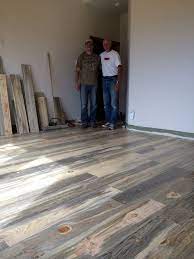 Call the wooden floor company! Hand Scraped Beetle Kill Pine Flooring Sustainable Lumber Co