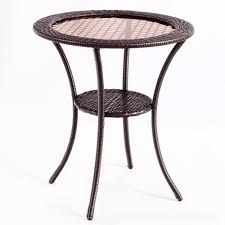 Sturdy enough to hold your favorite tabletop décor tapering legs in warm glossy wood contrast with a black glass top with a cool shine. Round Rattan Wicker Glass Top Steel Frame Coffee Table