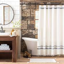This curvy shower curtain rod can support bulky fabrics. Farmhouse Shower Curtains Target