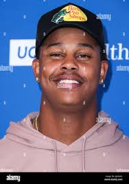 Annual charity baseball game hi-res stock photography and images