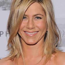 The middle parting helps to frame her face evenly on both sides and the. Jennifer Aniston S Best Hairstyles Of All Time