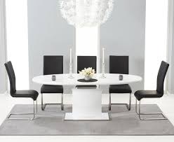A range of stunning modern dining furniture. 200cm Oval White Gloss Dining Table 6 Black Chairs Homegenies