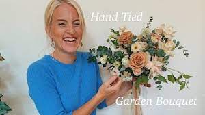 Bridal pair driving motor scooter wearing gown and suit. How To Make A Wedding Bouquet Garden Style Youtube