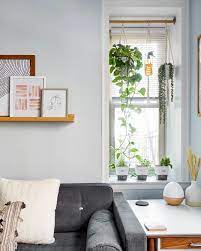 Bright Natural Color Makes This 600 Square Foot Apartment Feel Like A Breath Of Fresh Air Comfortable Furniture Home Living Room Wall